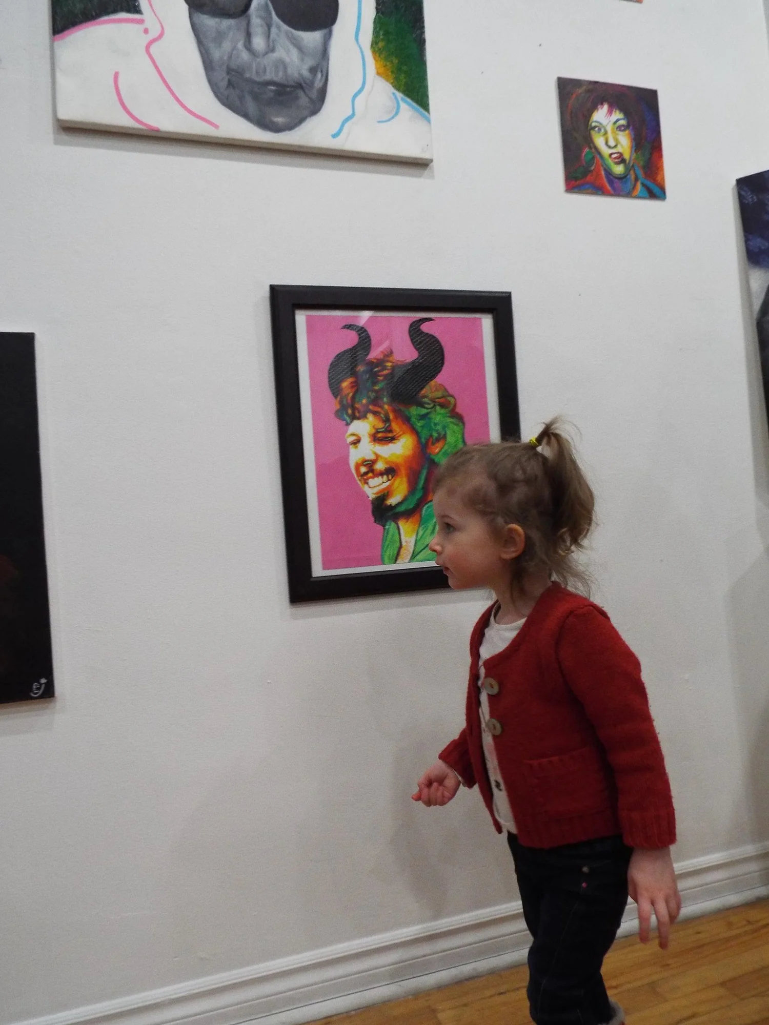 young visitor admiring the art