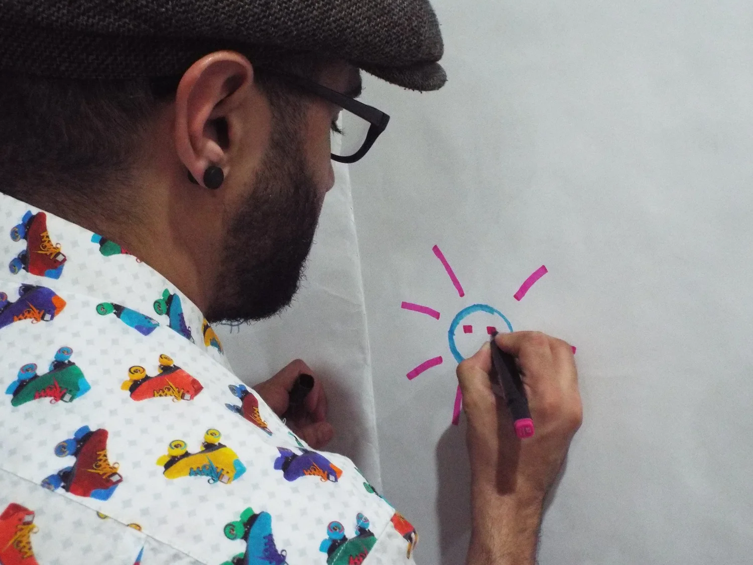 Karim drawing on the wall