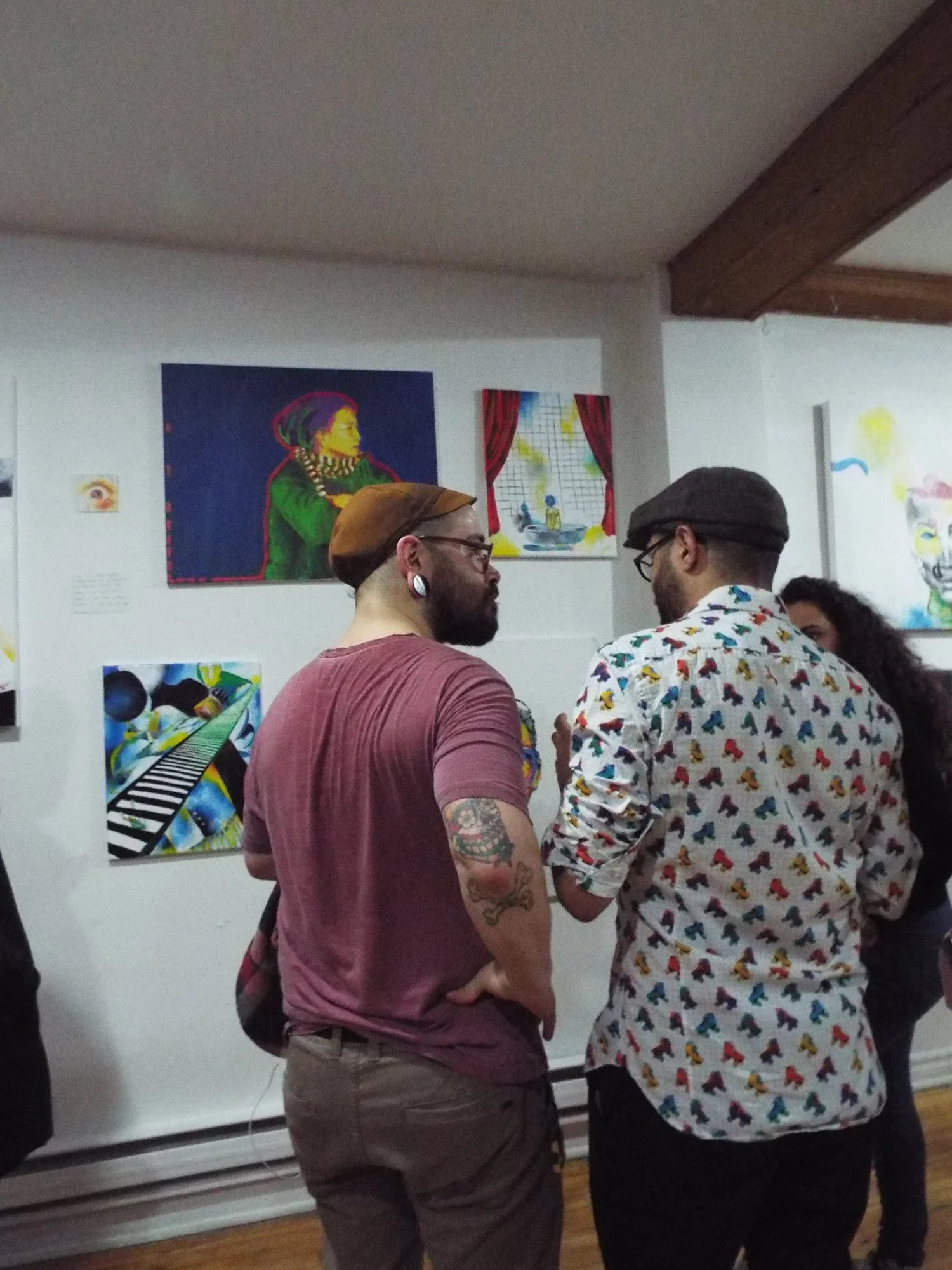 guests looking at paintings