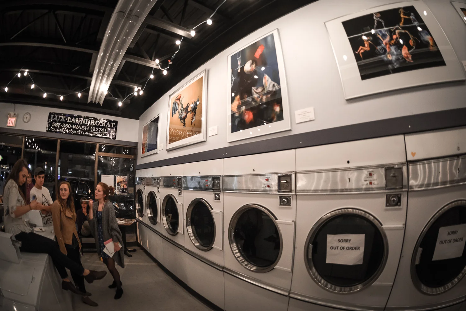 guests mingling among the artwork