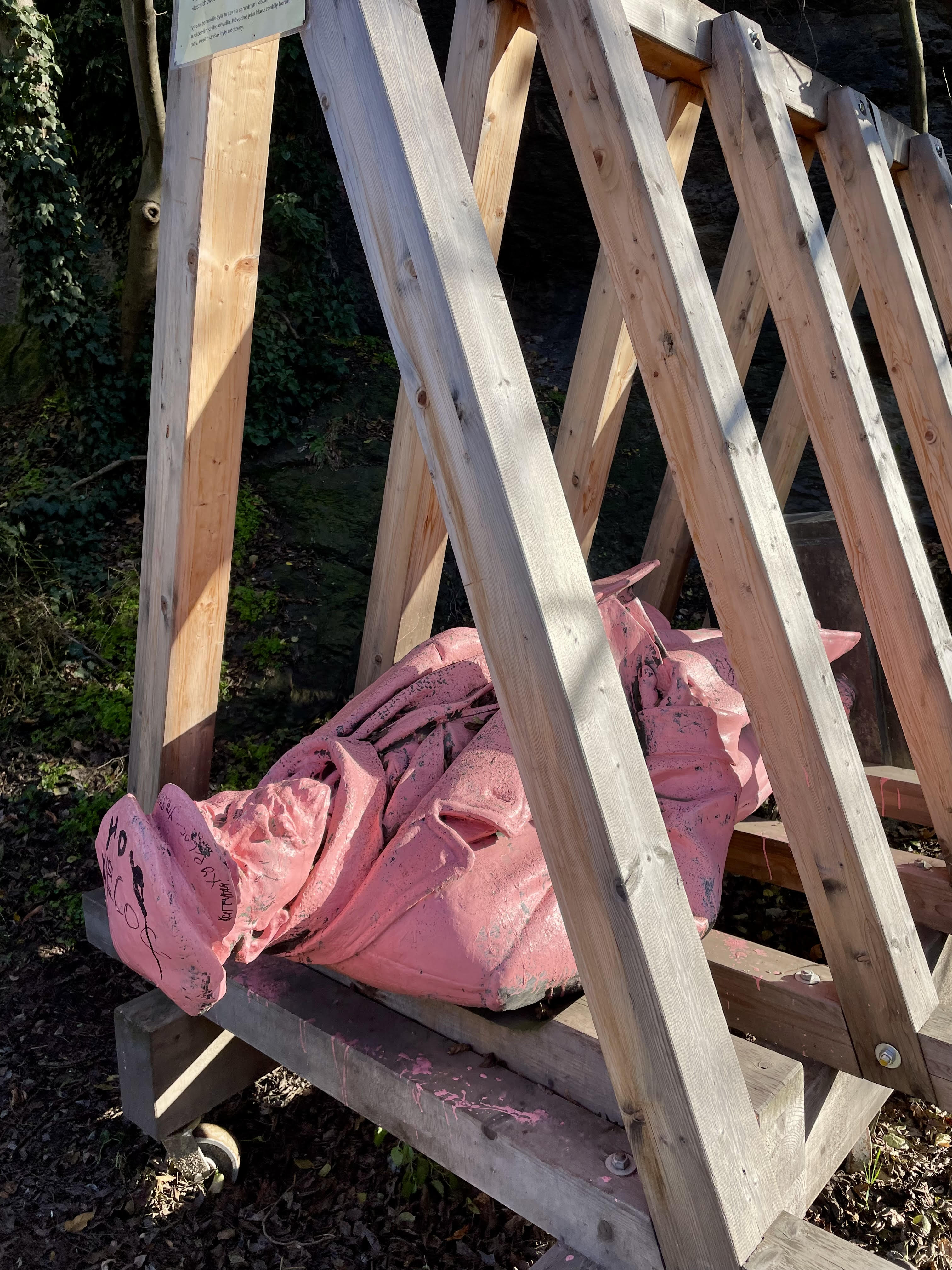 Pink Stalin statue lying on its back, Prague