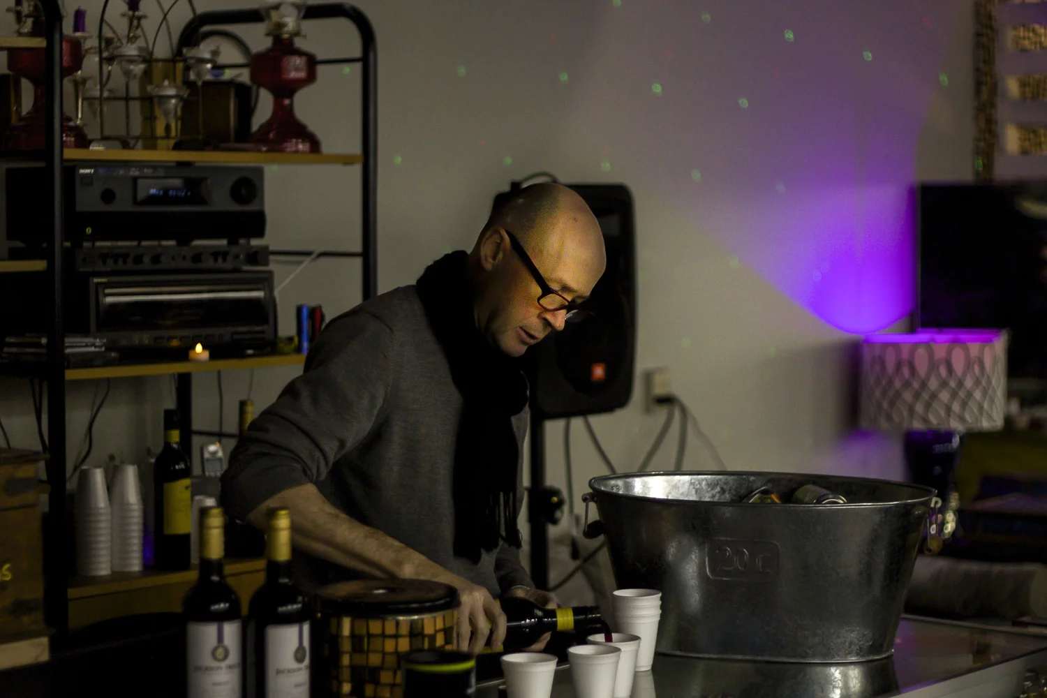 pouring wine at the gallery bar